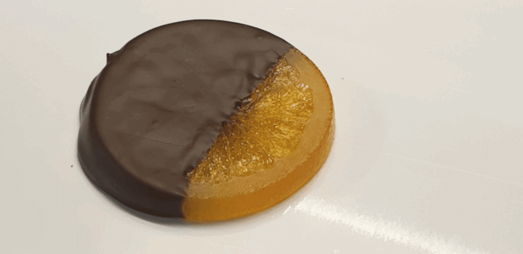 rondelle d'orange confite enrobé de pâte de noisette
